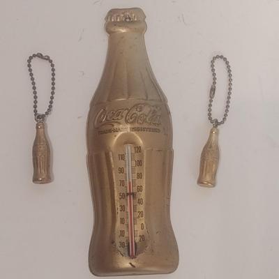Vintage Tin Coca-Cola Wall Thermometer and Two Coca-Cola Key Chains