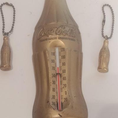 Vintage Tin Coca-Cola Wall Thermometer and Two Coca-Cola Key Chains