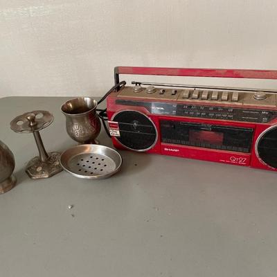 Metal bathroom decor with Sharp radio