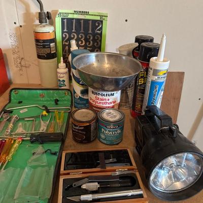 Tools, flashlight, torch, stain and flex seal