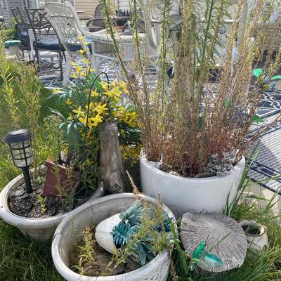 Outdoor grouping of pots and decor