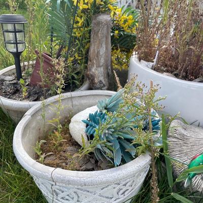Outdoor grouping of pots and decor