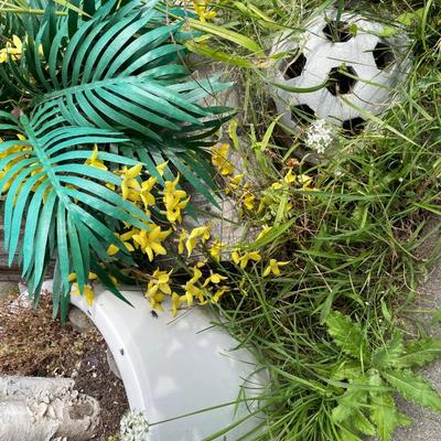 Outdoor grouping of pots and decor