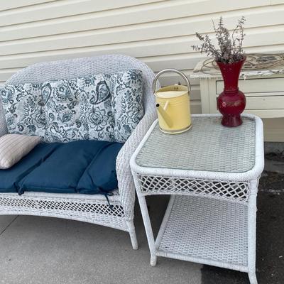 White wicker, loveseat, and table