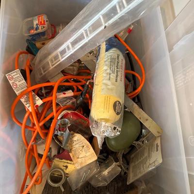 Tote and bucket of household hardware