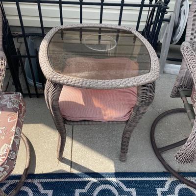 Brown wicker chairs and table