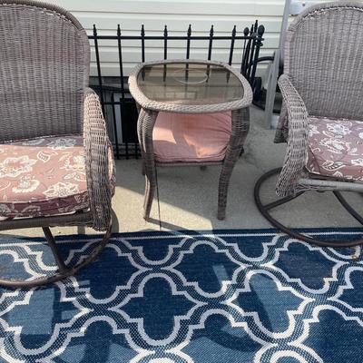 Brown wicker chairs and table