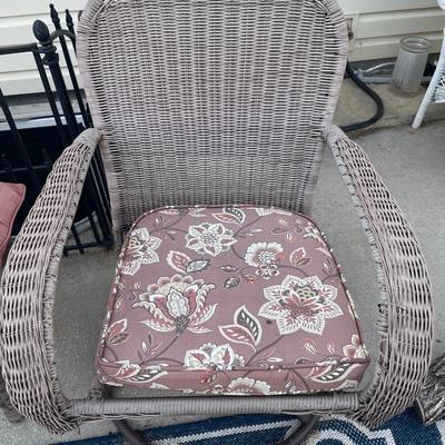 Brown wicker chairs and table