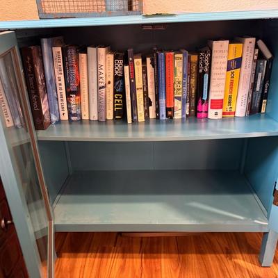 Sale Photo Thumbnail #712: Cute small blue cabinet plus books and decor