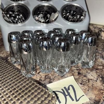 Sale Photo Thumbnail #806: Silverware container, silverware, salt and pepper shakers, placemats
