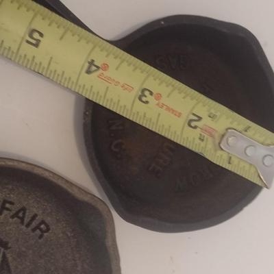 Set of Three Vintage Miniature Cast Iron Advertising Skillets and Ashtray