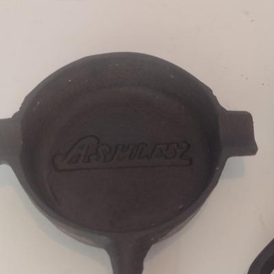 Set of Three Vintage Miniature Cast Iron Advertising Skillets and Ashtray