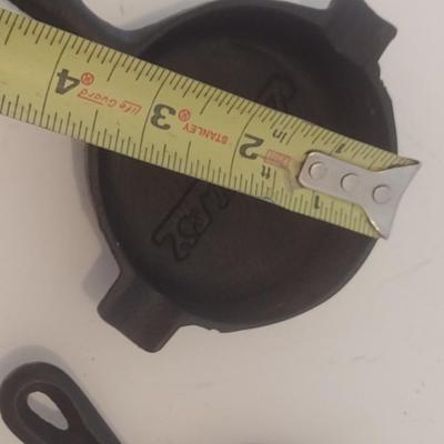 Set of Three Vintage Miniature Cast Iron Advertising Skillets and Ashtray