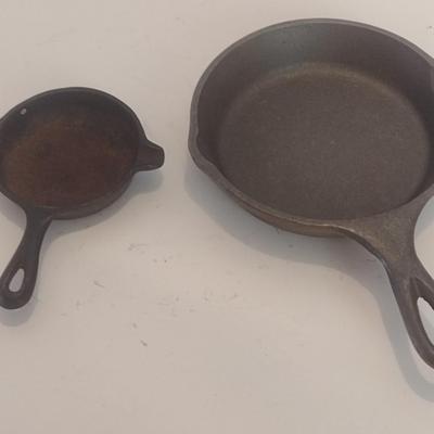 Pair of Cast Metal Skillets Wagner Ware and Cracker Barrel