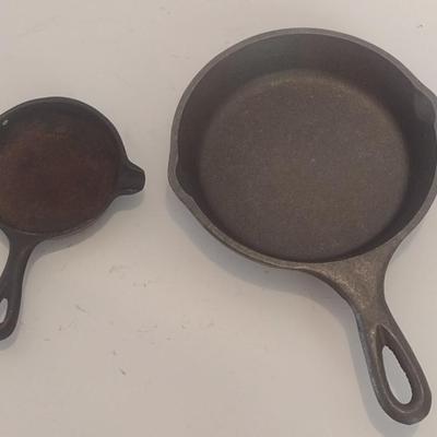 Pair of Cast Metal Skillets Wagner Ware and Cracker Barrel