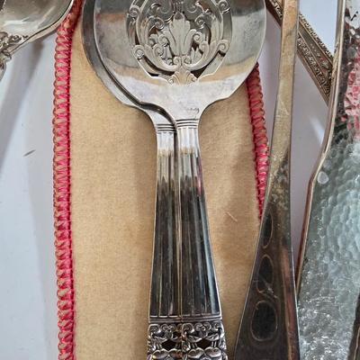 LOT 104G: Silverplate Serving Utensils, Including Cheese Knives, Absinthe Spoons, and Carving Set