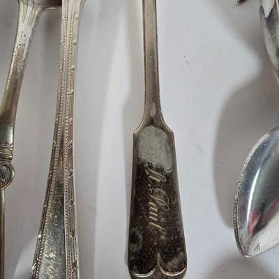 LOT 104G: Silverplate Serving Utensils, Including Cheese Knives, Absinthe Spoons, and Carving Set
