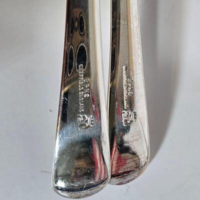 LOT 104G: Silverplate Serving Utensils, Including Cheese Knives, Absinthe Spoons, and Carving Set