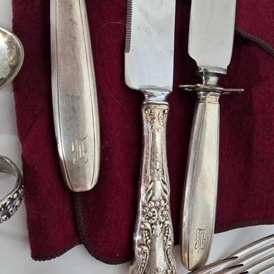 LOT 104G: Silverplate Serving Utensils, Including Cheese Knives, Absinthe Spoons, and Carving Set