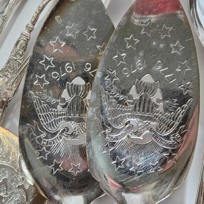 LOT 104G: Silverplate Serving Utensils, Including Cheese Knives, Absinthe Spoons, and Carving Set