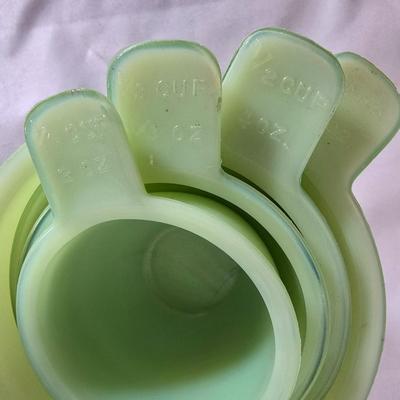 LOT 113G: Uranium Glass Measuring Cups, Gold Rimmed Ceramic Mixing Bowls, and 2 Glass Canisters
