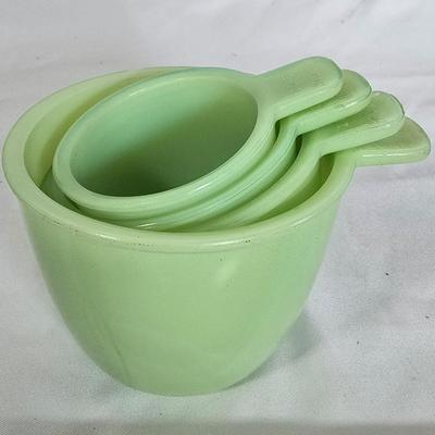 LOT 113G: Uranium Glass Measuring Cups, Gold Rimmed Ceramic Mixing Bowls, and 2 Glass Canisters