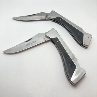 LOT 73: Pair of Sharp 300 Folding Knives with Leather Sheaths