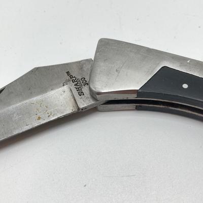 LOT 73: Pair of Sharp 300 Folding Knives with Leather Sheaths