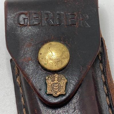 LOT 74: Vintage Gerber Portland, OR 97223 USA Folding Knife with Leather Sheath