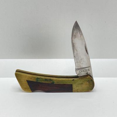 LOT 74: Vintage Gerber Portland, OR 97223 USA Folding Knife with Leather Sheath