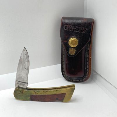 LOT 74: Vintage Gerber Portland, OR 97223 USA Folding Knife with Leather Sheath