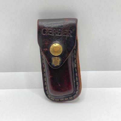 LOT 74: Vintage Gerber Portland, OR 97223 USA Folding Knife with Leather Sheath