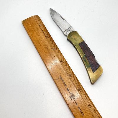LOT 74: Vintage Gerber Portland, OR 97223 USA Folding Knife with Leather Sheath