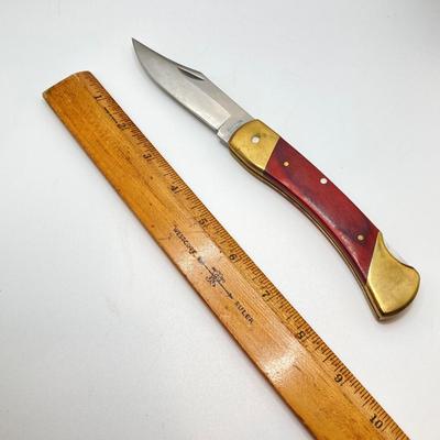 LOT 75: Vintage Uncle Henry Schrade Folding Knife with Leather Sheath
