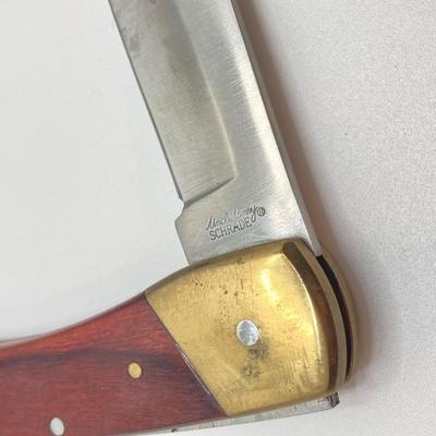 LOT 75: Vintage Uncle Henry Schrade Folding Knife with Leather Sheath