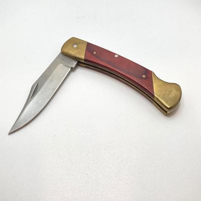 LOT 75: Vintage Uncle Henry Schrade Folding Knife with Leather Sheath