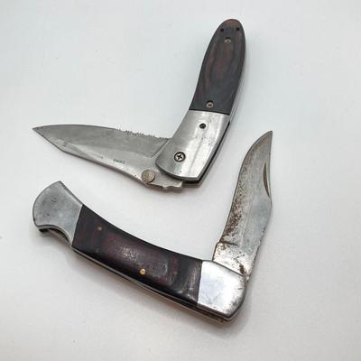 LOT 76: Pair of Folding Knives with Leather Sheaths