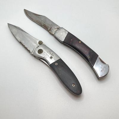 LOT 76: Pair of Folding Knives with Leather Sheaths
