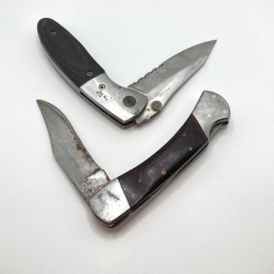 LOT 76: Pair of Folding Knives with Leather Sheaths