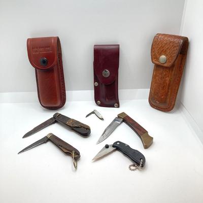 LOT 77: Collection of Vintage Pocket Knives with Sheaths