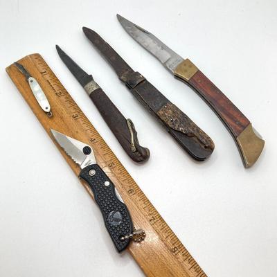 LOT 77: Collection of Vintage Pocket Knives with Sheaths