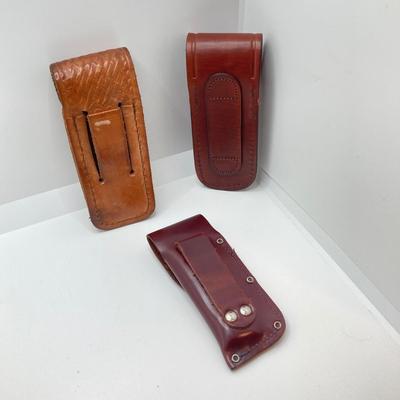 LOT 77: Collection of Vintage Pocket Knives with Sheaths