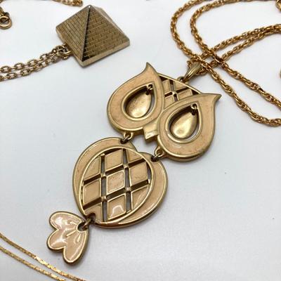 LOT 81: Vintage Gold Tone Jewelry Collection - Talisman Guild 1976 Pyramid Pendant Necklace, Articulated Owl Necklace,