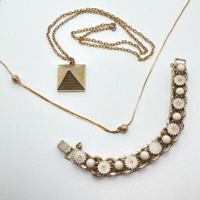 LOT 81: Vintage Gold Tone Jewelry Collection - Talisman Guild 1976 Pyramid Pendant Necklace, Articulated Owl Necklace,
