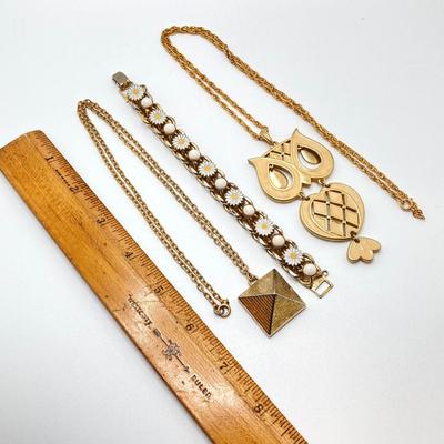 LOT 81: Vintage Gold Tone Jewelry Collection - Talisman Guild 1976 Pyramid Pendant Necklace, Articulated Owl Necklace,