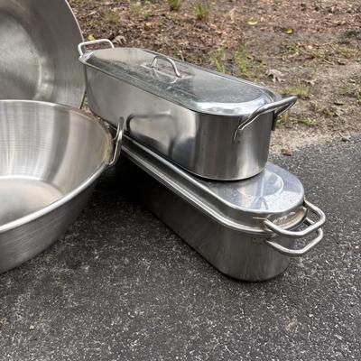 LOT 93: Stainless Steel Cookware Collection: Flatbottom Pan/Wok (2), Juicer Pot Made in Finland, Poacher/Steamer Pots