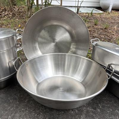 LOT 93: Stainless Steel Cookware Collection: Flatbottom Pan/Wok (2), Juicer Pot Made in Finland, Poacher/Steamer Pots