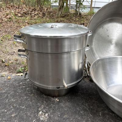 LOT 93: Stainless Steel Cookware Collection: Flatbottom Pan/Wok (2), Juicer Pot Made in Finland, Poacher/Steamer Pots
