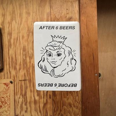 LOT 97: Vintage Signs & Ephemera - Wally Wood Disneyland Erotic Art, Before and After Beer Sign & 1970s Tommy Toilet Poster