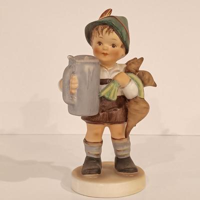 LOT 113: Hummel Goebel Merry Wanderer and For Father Figurines with Hummel Ornament & Painted Wood Die Cuts
